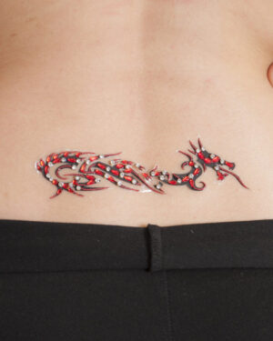 1083 - Dragon Lower Back Gem Tattoo