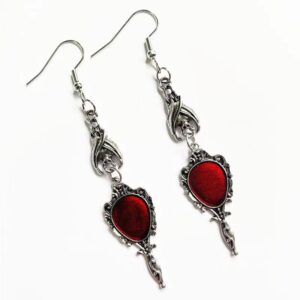 55515 - Vintage Hand Mirror with Red Gem and Bat Earrings..